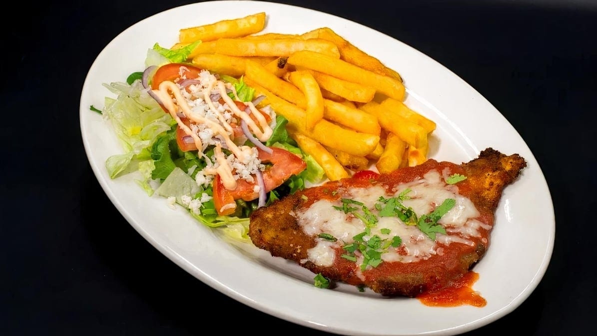 Chicken Milanesa Huichol Combination Plate.